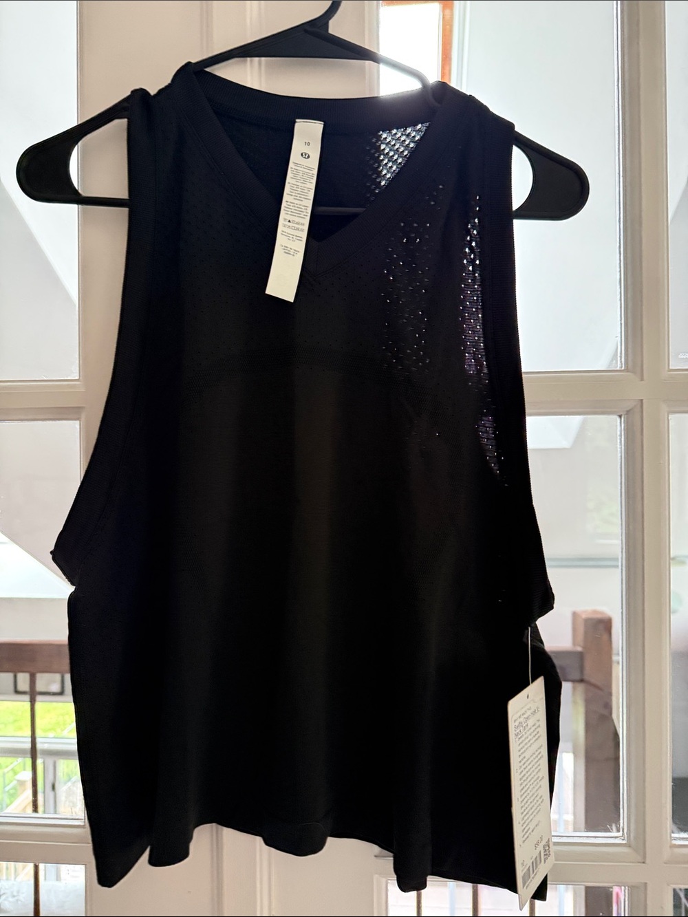 45. NWT swiftly open hole v neck tank